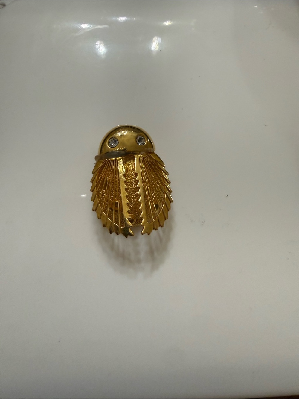 Gold ladybug brooch